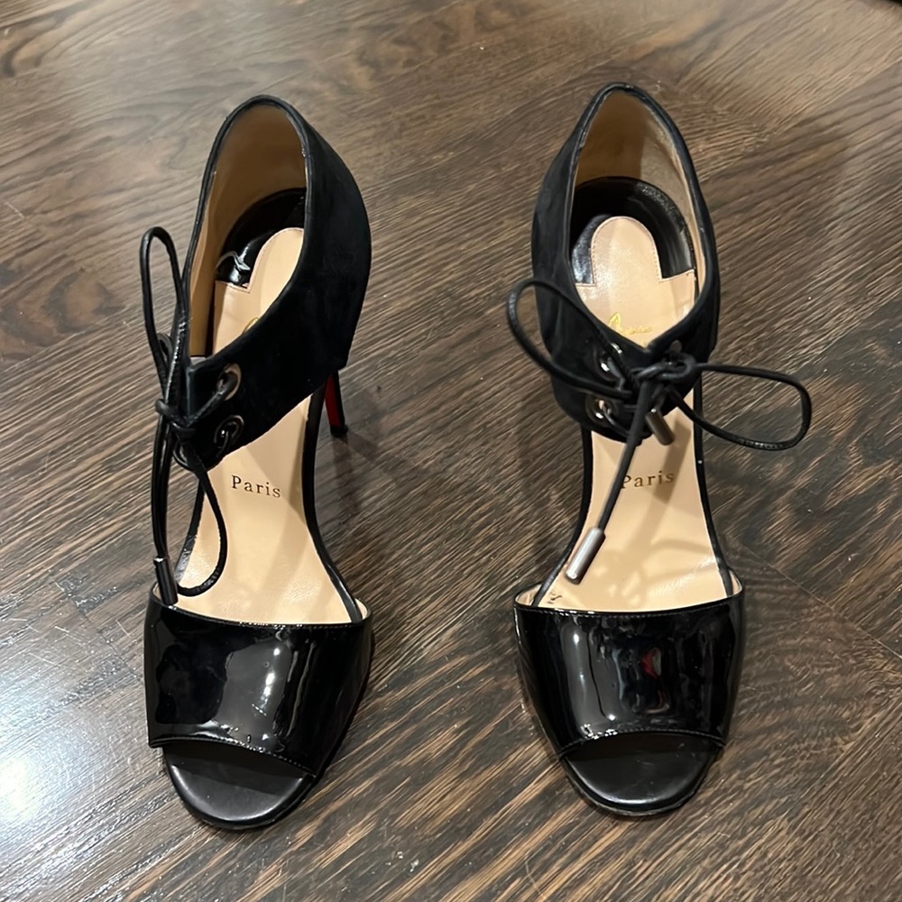 Mayerling stiletto sandals make a bold statement in patent leather and suede.
